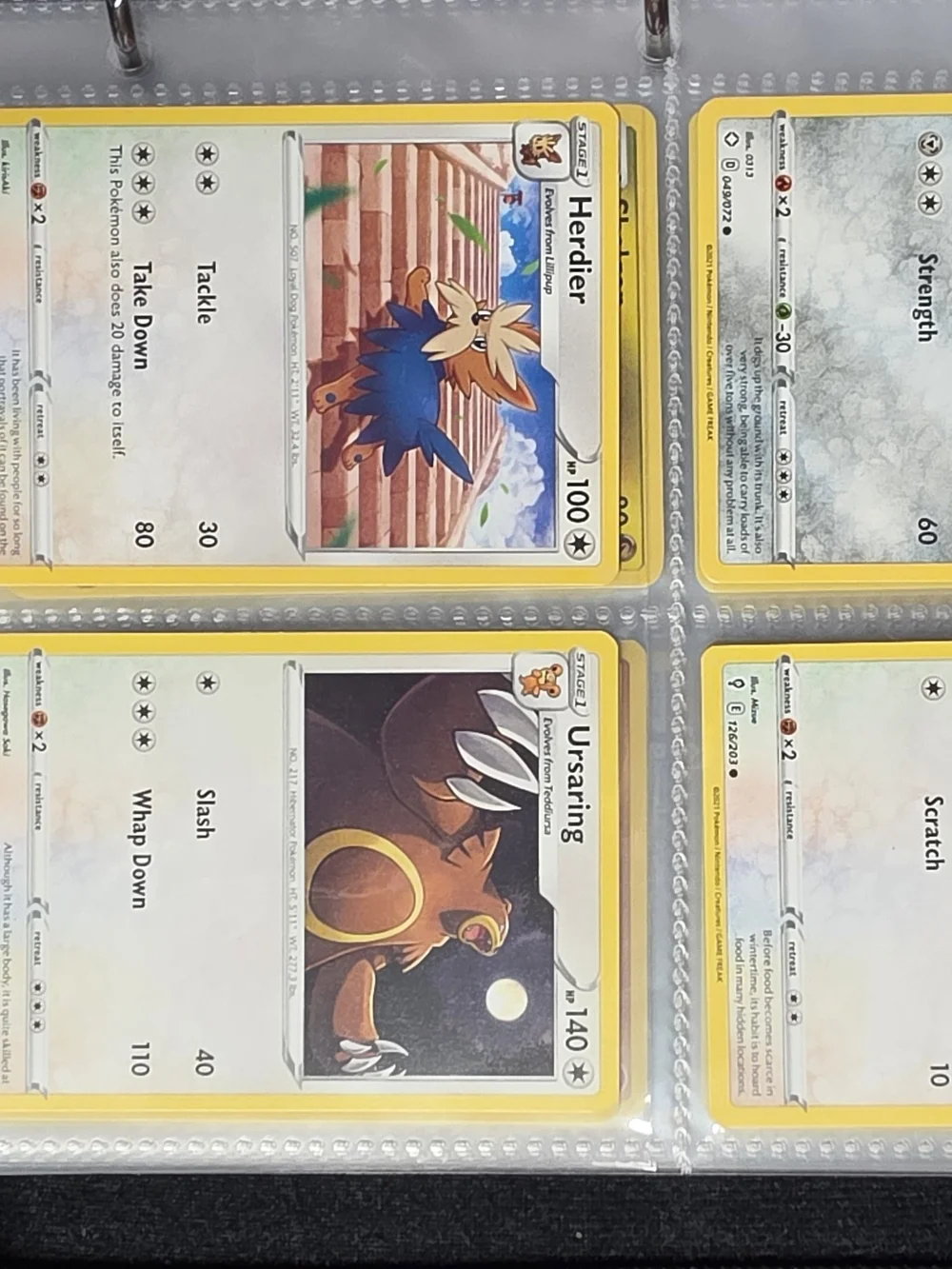 Pokemon Red and Blue Pokemon Card Binder And 53 Pokemon Cards.